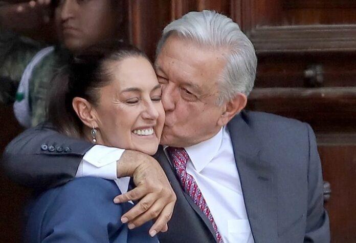 AMLO kissing Sheinbaum